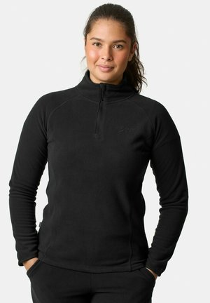 Zwarte fleece pullover met een hoge kraag en een halve rits. Heeft een zachte textuur en lange mouwen, met een klein logo op de borst.