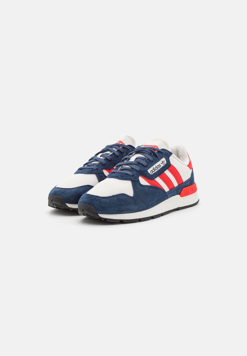 red and navy blue adidas
