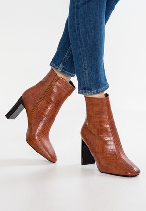 High heeled ankle boots - brown