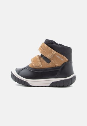 OMAR UNISEX - Vinterstøvler - black/dark yellow
