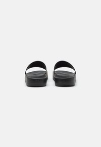 Calvin Klein CHUNKY POOL SLIDE - Papucsszandálok - black