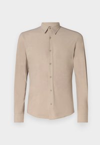 Beige långärmad skjorta med knappar, gjord av slätt tyg, med klassisk krage, knappstängning framtill och rundad nederkant.