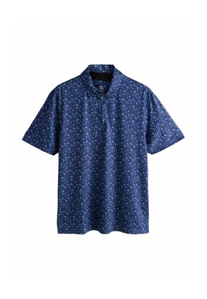 Short-sleeve polo shirt in navy fabric featuring a scattered white and green abstract pattern, with a stand collar and a button closure.