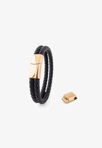 Wybrany, gold coloured black