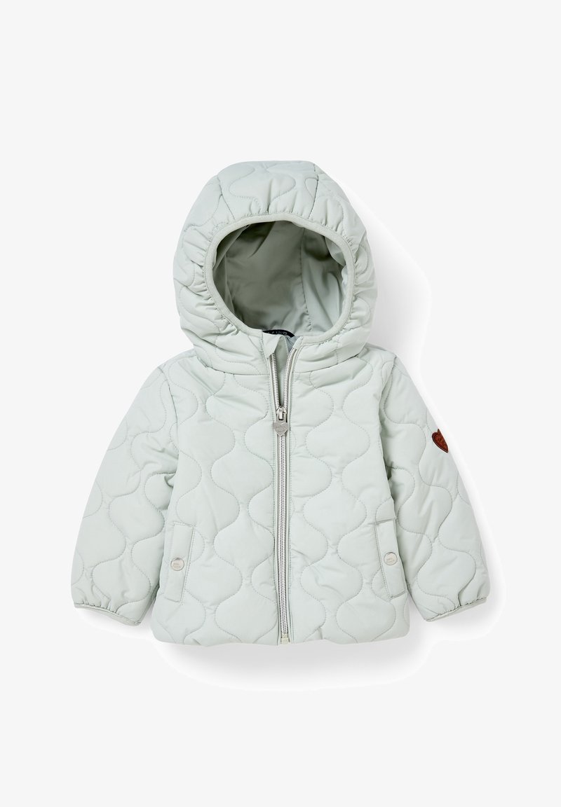 Lys grøn quilted jakke med hætte, der har en frontlynlås, elastiske manchetter og en dekorativ brun lap på ærmet.