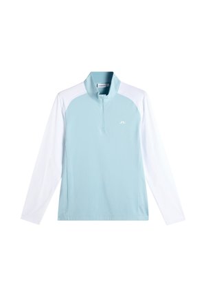 Polo de sport à manches longues bleu clair et blanc avec une fermeture éclair quart et un petit logo sur la poitrine.