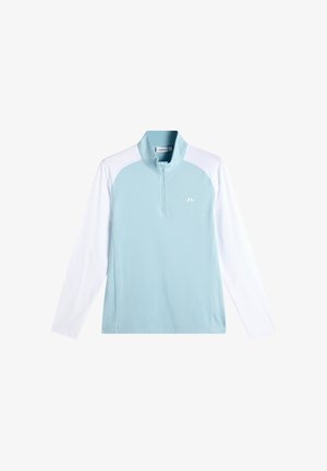 Polo de sport à manches longues bleu clair et blanc avec une fermeture éclair quart et un petit logo sur la poitrine.