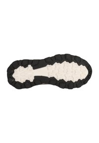 Suola di scarpa in bianco e nero con un design di battistrada robusto e strutturato. Presenta dei lobi rialzati per la trazione e una striscia centrale liscia.
