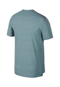 Short-sleeve t-shirt in light blue, featuring a subtle striped pattern, round neckline, and soft texture.