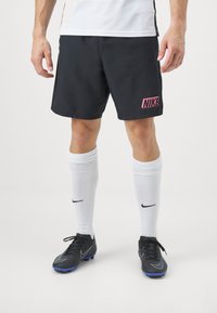Nike Performance ACADEMY 23 - Pantalón corto de deporte - black/sunset pulse