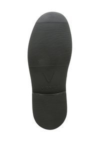Suola di scarpa in gomma nera con superficie texture, caratterizzata da righe orizzontali e un logo impresso al centro. Design piatto per stabilità.