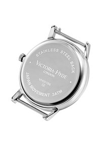Stainless steel watch back with engraved text: "Victoria Hyde London," "Japan Movement," and "3ATM." Silver color, smooth texture.