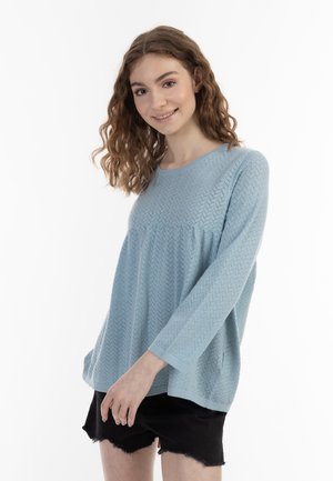- Sweter