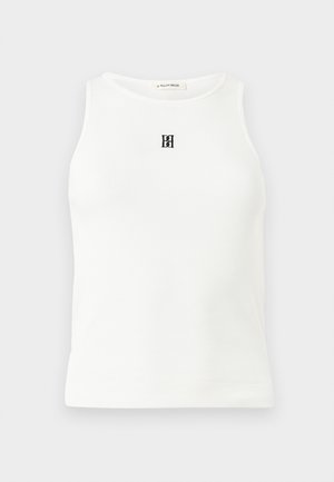 Λευκό μπουστάκι χωρίς μανίκια με ριμπ ύφανση, στρογγυλή λαιμόκοψη και μικρό μαύρο κεντητό λογότυπο στο κέντρο του στήθους.