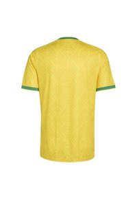 Κίτρινο πουκάμισο με κοντά μανίκια και διακριτικό διαγώνιο σχέδιο, πράσινο γιακά και άκρες στα μανίκια, εμφανίζεται από πίσω σε λευκό φόντο.