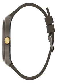 Okrągły zegarek z elegancką, czarną kopertą; złota koronka; ciemnoszary silikonowy pasek; minimalne detale sprzętowe; nowoczesne cechy designu.