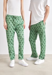 Carlo Colucci TRACKSUIT PANT UNISEX - Tréningruha alsók - light green