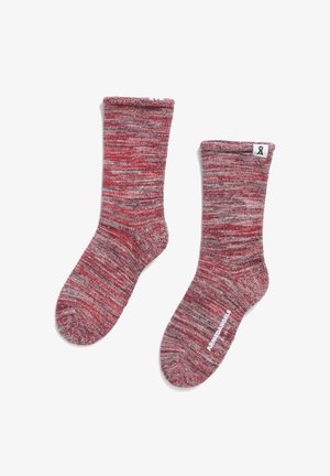 Rote und graue melierte Wollsocken mit gerippten Bündchen und verstärkten Zehen. Verfügen über ein kleines Etikett mit einem Logo am Bündchen.