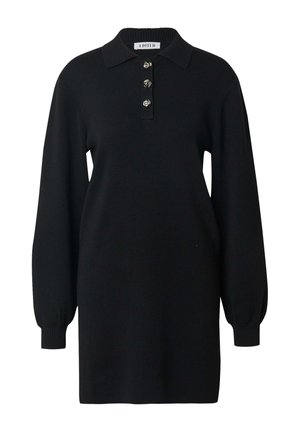Schwarzes Strickkleid mit einem Kragen und einer Knopfleiste mit drei Knöpfen. Mit langen Puffärmeln und einem lockeren Schnitt. Weicher Stoff.