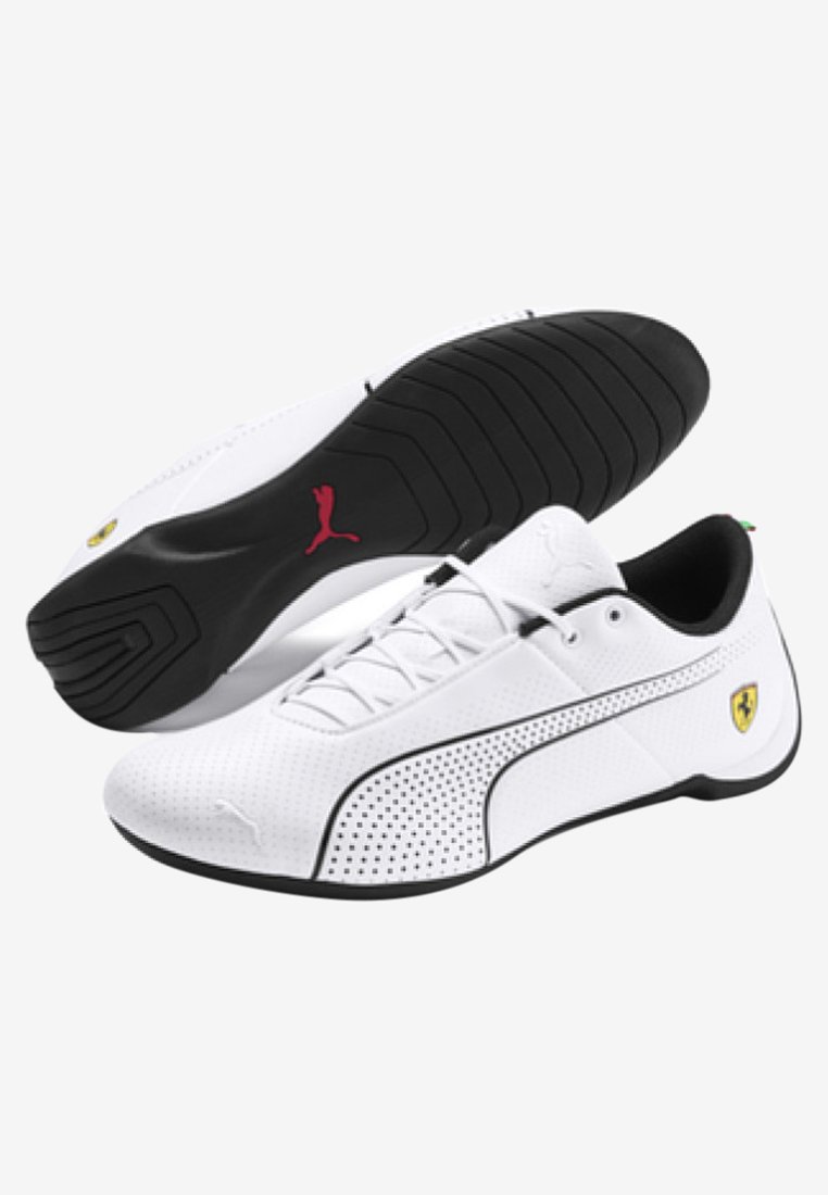 puma black and white trainers