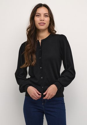 Zwarte cardigan van zacht materiaal, met een ronde halslijn, knoopsluiting en puffed lange mouwen. Getextureerde geribde manchetten.