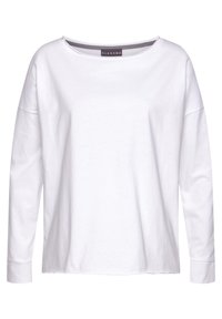 Valkoinen pitkähihainen paita pehmeää puuvillaa, jossa on tilava kaula-aukko, laskettu olkalinja ja hihansuut. Yksinkertainen, sileä kangas ilman kuvioita.