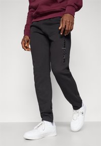 Champion ICONS TONAL CUFF LARGE LOGO - Tracksuit bottoms - black