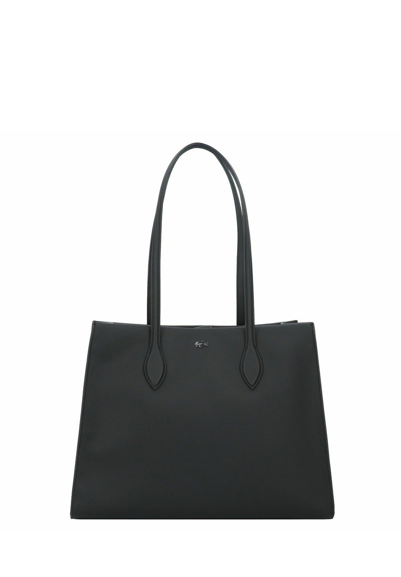 Sac fourre-tout en cuir noir avec une texture lisse, deux anses allongées et un design minimaliste. Présente un petit logo sur le devant.