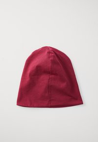 Red cotton beanie hat with a fitted design, smooth texture, and a pointed top. No visible patterns or accents. Flat on a white background.