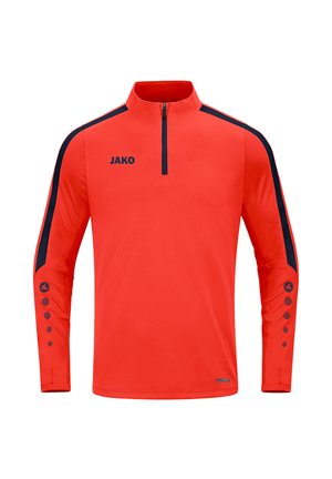 Rotes sportliches Langarmoberteil mit halbem Reißverschluss am Kragen, schwarzen Seitenstreifen und kreisförmigem Akzentmuster an den Ärmeln. Logo auf der Brust platziert.