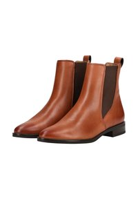 Bottines en cuir marron avec des panneaux latéraux en élasthanne, bout pointu et petit talon carré. Texture lisse avec des accents en tissu contrasté.