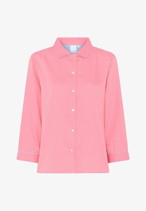 Roza srajca z gumbom in ovratnikom, dolge rokave in modrim akcentnim šivanjem. Zanj so značilni gumbi, podobni biserom, ki se nahajajo ob sprednji strani.