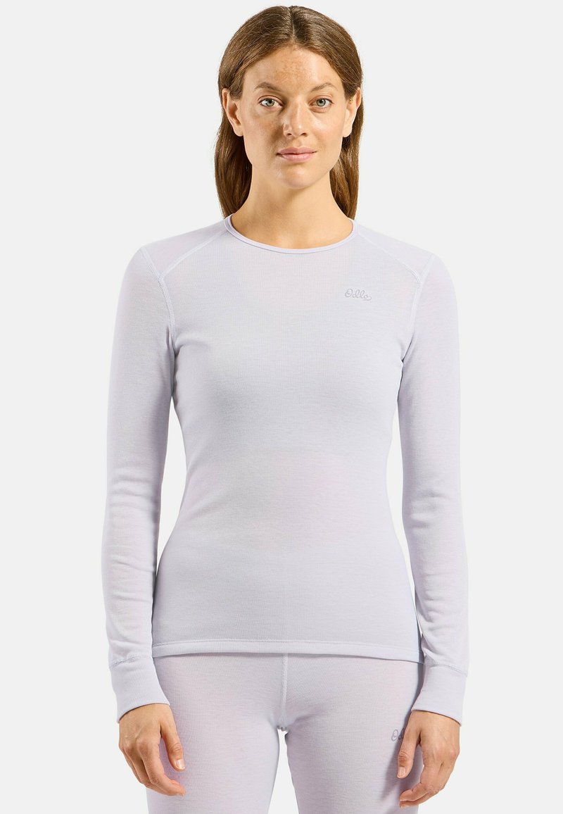 Light purple long-sleeve thermal top with a ribbed texture and embroidered logo on the chest. Features flat seams and a crew neck design.