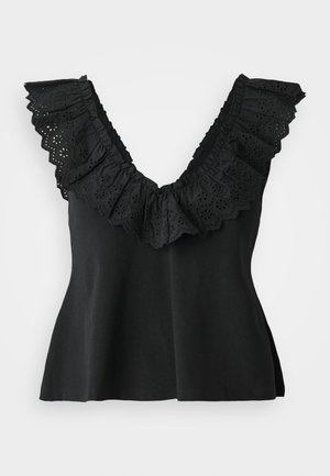 Top sans manches noir avec un décolleté en V profond et une large bordure volantée présentant des découpes florales. Texture douce ; coupe décontractée avec une légère évasement.