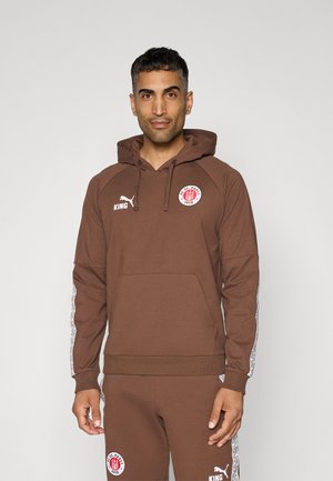 Brun hættet sweatshirt med lomme, der har hvide logoer og mønstrede detaljer ned ad ærmerne. Lavet af blødt stof med en afslappet pasform.