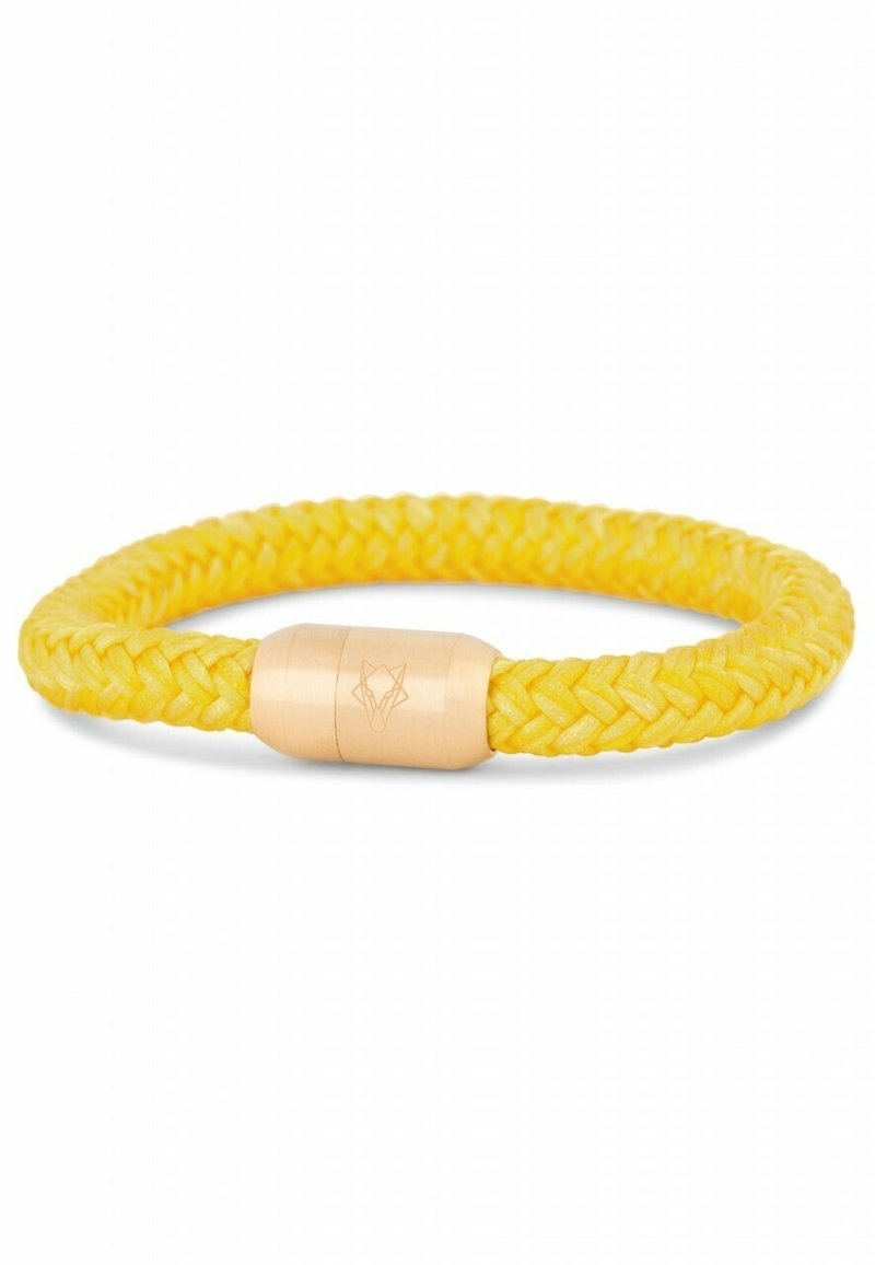 Bracelet tressé jaune avec un fermoir magnétique doré gravé d’un contour de tête de renard.
