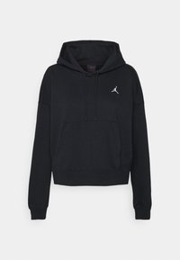 Sudadera negra con bolsillo frontal, mangas largas y capucha con cordón. Presenta un pequeño logo Jumpman blanco en el pecho. Tejido suave.