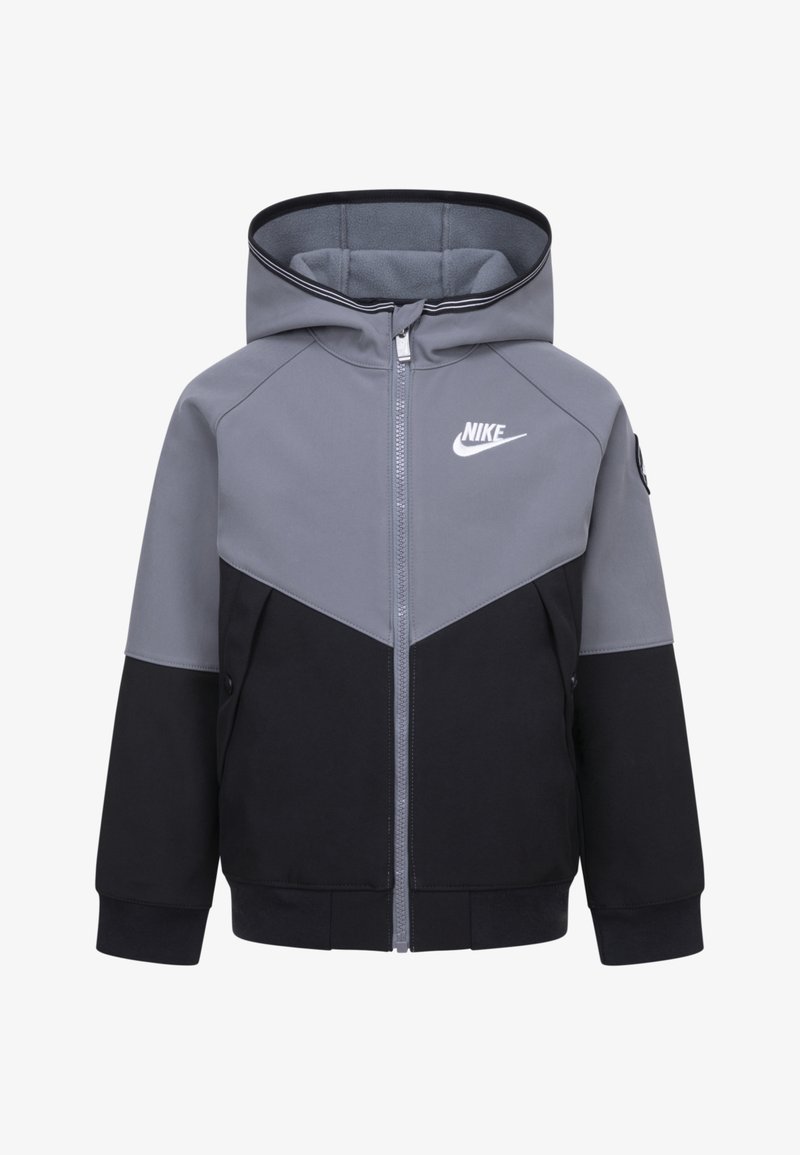 Šedá a černá mikina na zip s kontrastním designem, obsahující logo Nike, boční kapsy a elastické manžety. Měkká tkanina s kapucí.