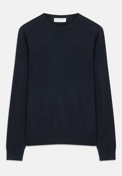 Dunkelblaues Rundhals Sweatshirt aus weichem Material. Verfügt über lange Ärmel sowie gerippte Bündchen und Saum. Schlicht, einfarbig ohne Muster.