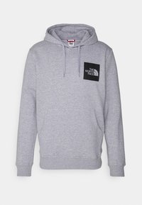 Sudadera gris de mezcla de algodón, con bolsillo canguro, capucha con cordón y un logo cuadrado negro en el pecho.