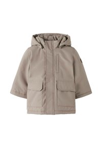Beige vinterjakke med hætte, lynlås foran, to store lommer foran og en blød inderforing. Har et moderne, kasseformet design.