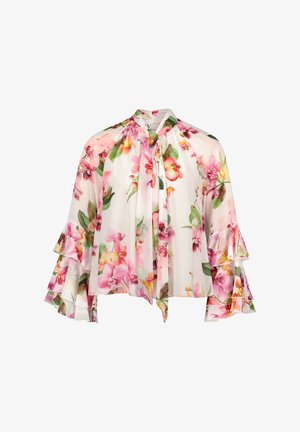 Transparante witte bloemenblouse met roze en gele bloemen, hoge halslijn met gebonden strik en gelaagde ruches belmouwen.