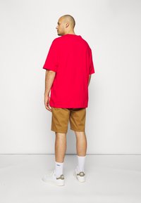 Tommy Hilfiger TEE - T-shirt básica - primary red