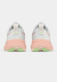 Light grey running shoes with a textured mesh upper, pink and green accents, and a cushioned pink sole. Reflective heel tab included.