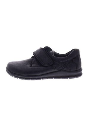 Black leather shoe with a textured surface, adjustable Velcro strap, and a flexible rubber sole designed for comfort and ease of use.