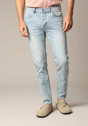 JOSUE - Jeans Tapered Fit - light stone destroy