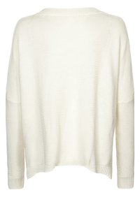 Biały, długi sweter z dzianiny z długim rękawem o luźnym kroju, z fakturowanym wzorem oraz ściągaczami przy mankietach i dolnym brzegu. Widok z tyłu.