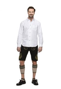 White button-down shirt, black shorts with gold embroidery, knit leg warmers, and black shoes. Slim fit with a classic design.