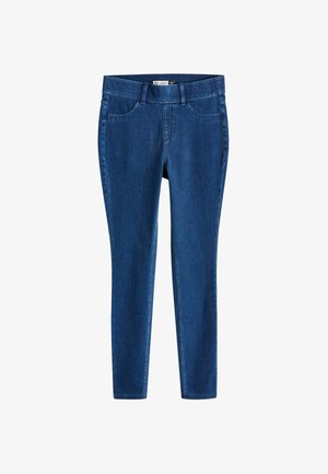 Kapeat farkut tummansinisessä denimissä, joissa on sileä pinta, viisi taskua ja keskikorkea vyötärö. Ei näkyvää kulutusta.