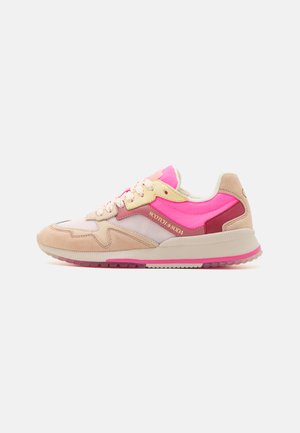 Sneakers featuring a mix of beige suede, pink mesh, and red accents. Thick white sole with pink accent, round toe, and lace-up design.